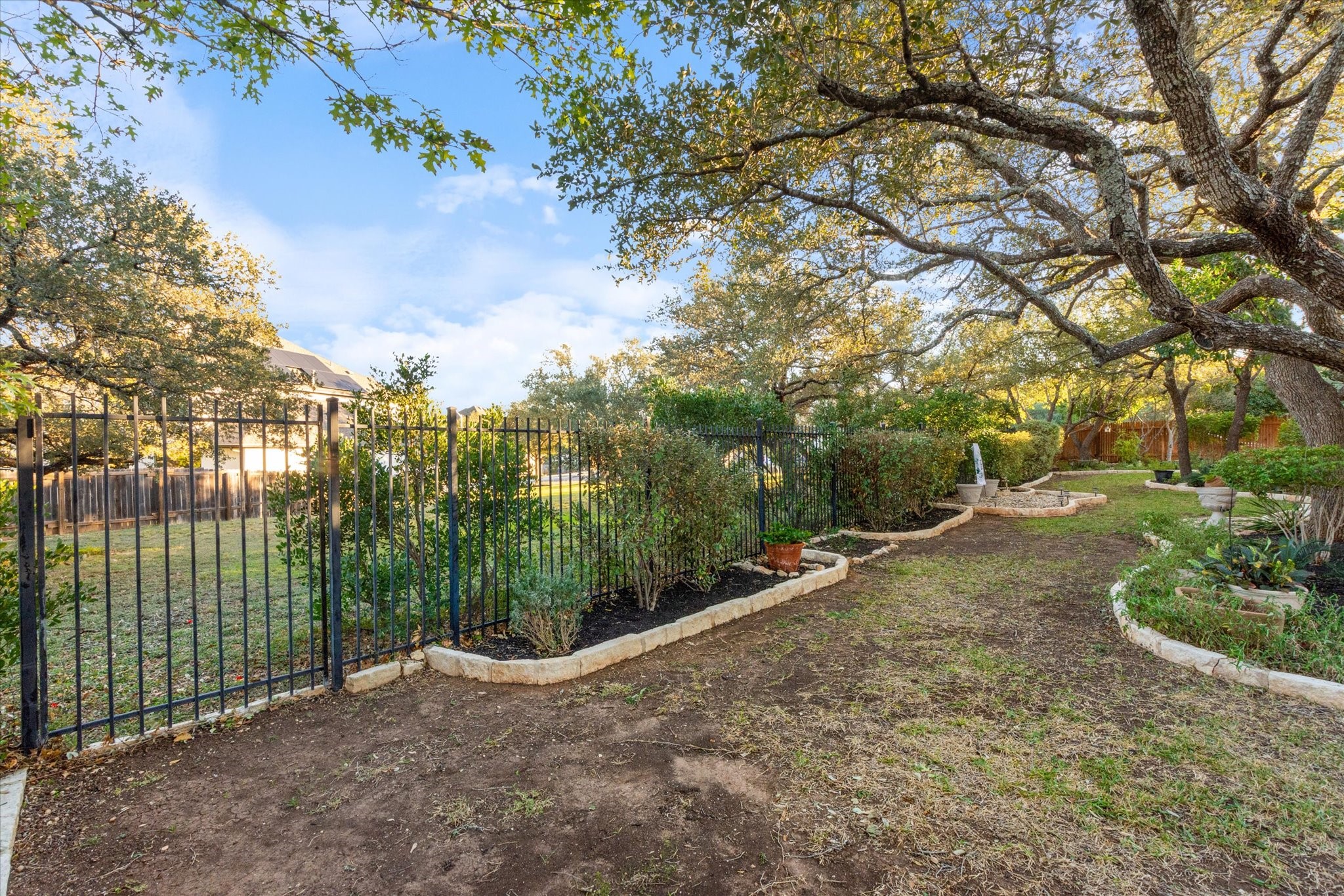5421 Cypress Ranch Boulevard Spicewood, TX 78669 - Photo 33 of 42 a view of a backyard