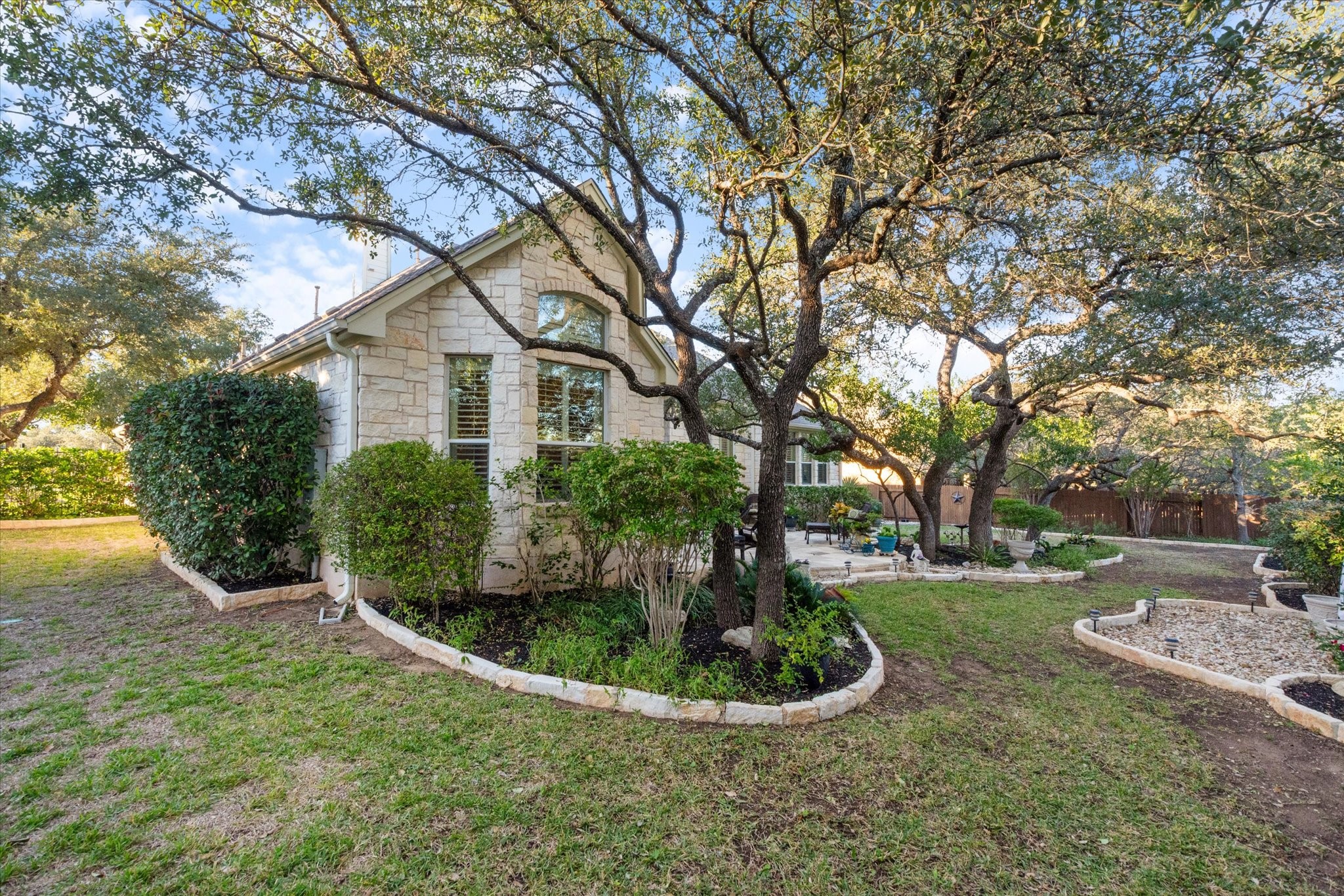 5421 Cypress Ranch Boulevard Spicewood, TX 78669 - Photo 34 of 42 a view of a garden with plants