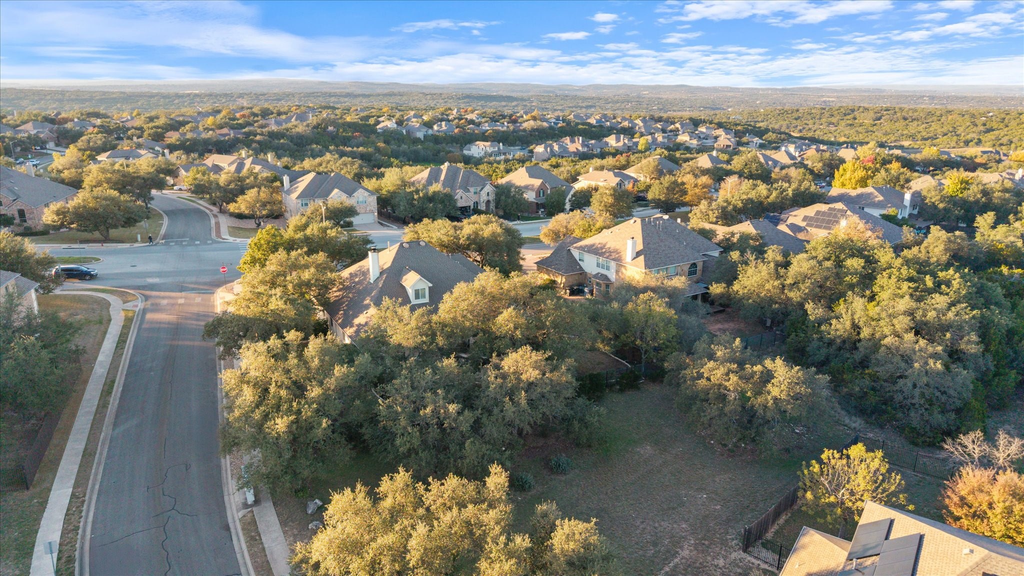5421 Cypress Ranch Boulevard Spicewood, TX 78669 - Photo 36 of 42 an aerial view of residential houses with outdoor space