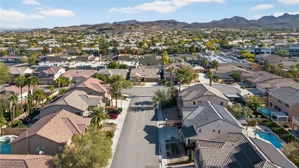 1028 Triumphant Street Henderson, NV 89052 - Photo 44 of 51 Aerial view of residential area featuring mountains