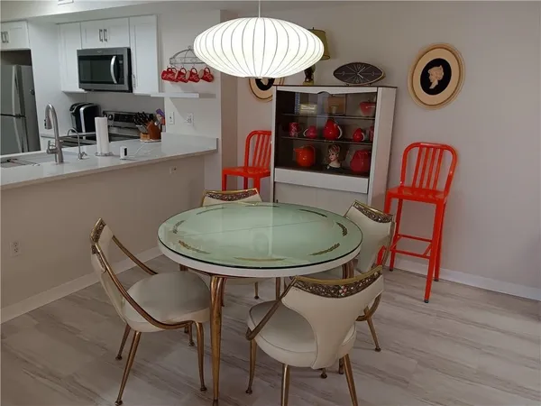 a table and chairs in a kitchen