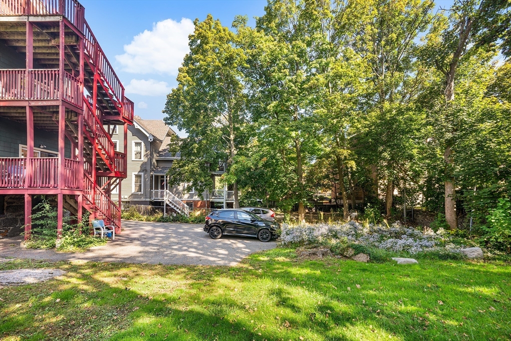 16 Mayfair Street Boston, MA 02119 - Photo 33 of 36 a view of a building with cars parked