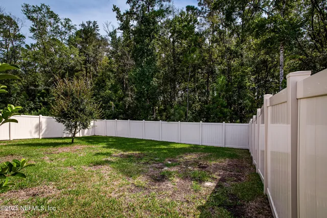 a view of swimming pool in a yard