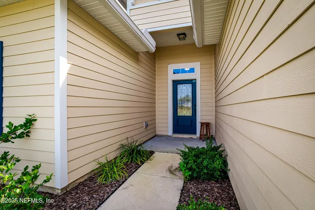 a view of a back yard of the house