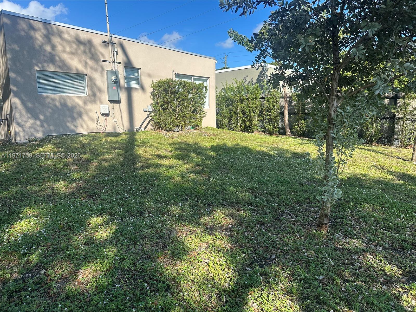2206 Simms Street Hollywood, FL 33020 - Photo 22 of 23 a view of a yard with plants