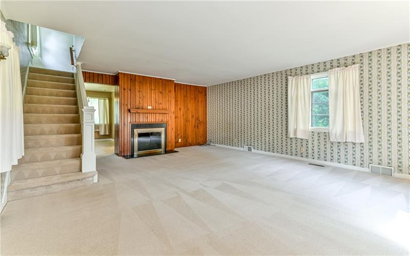 3940 Bakerstown Road Gibsonia, PA 15044 - Photo 5 of 25 Living Room and the doorway to the Kitchen is to the Left of Fireplace