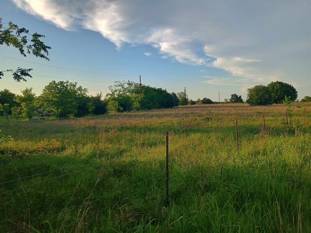 5330 Interstate 30 Campbell, TX 75422 - Photo 18 of 34 a view of a lake from a yard