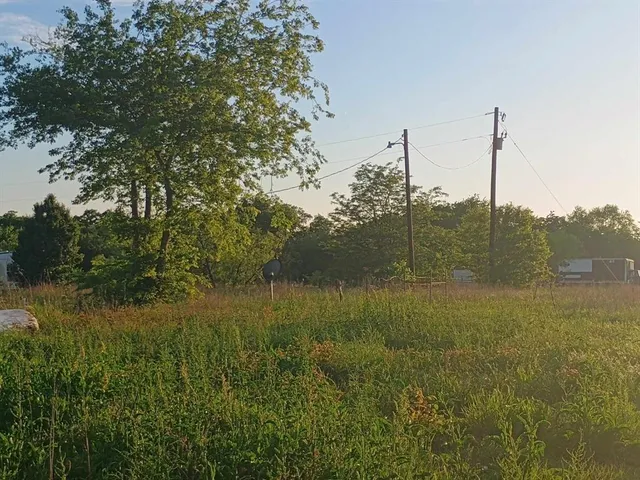 a view of a lake view with a garden
