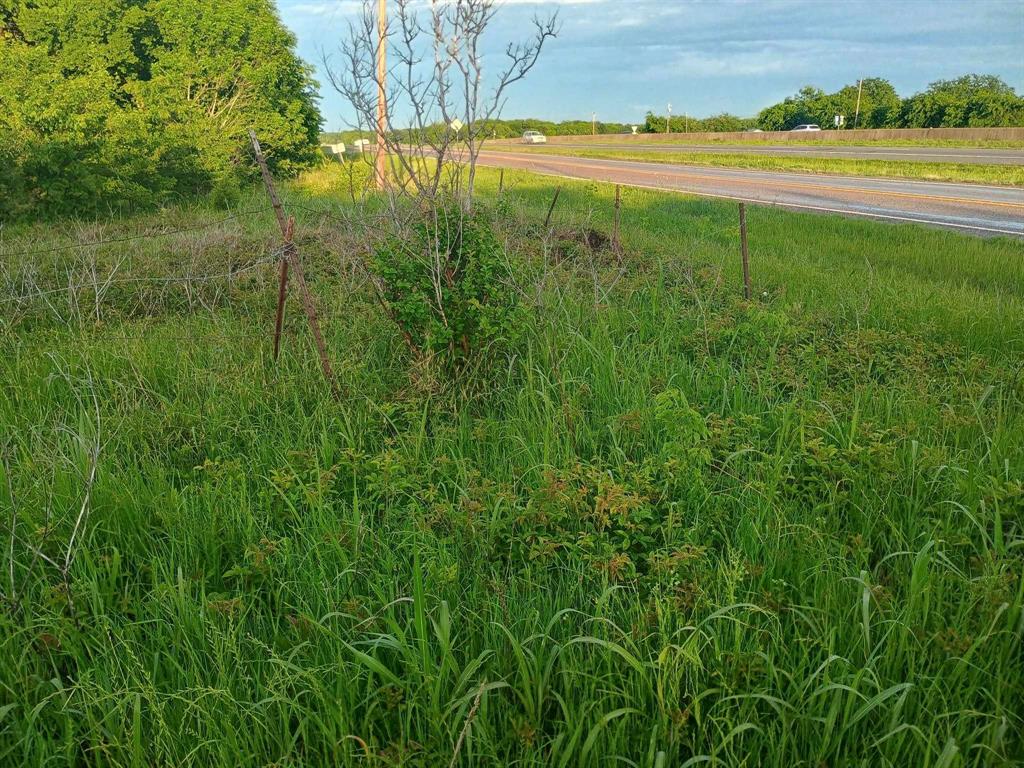 5330 Interstate 30 Campbell, TX 75422 - Photo 9 of 34 a view of a lake with a yard