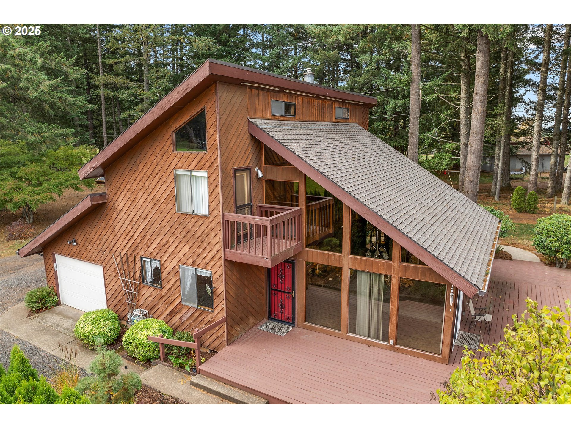 25164 South Springwater Road Estacada, OR 97023 - Photo 1 of 43 a view of house with a swimming pool