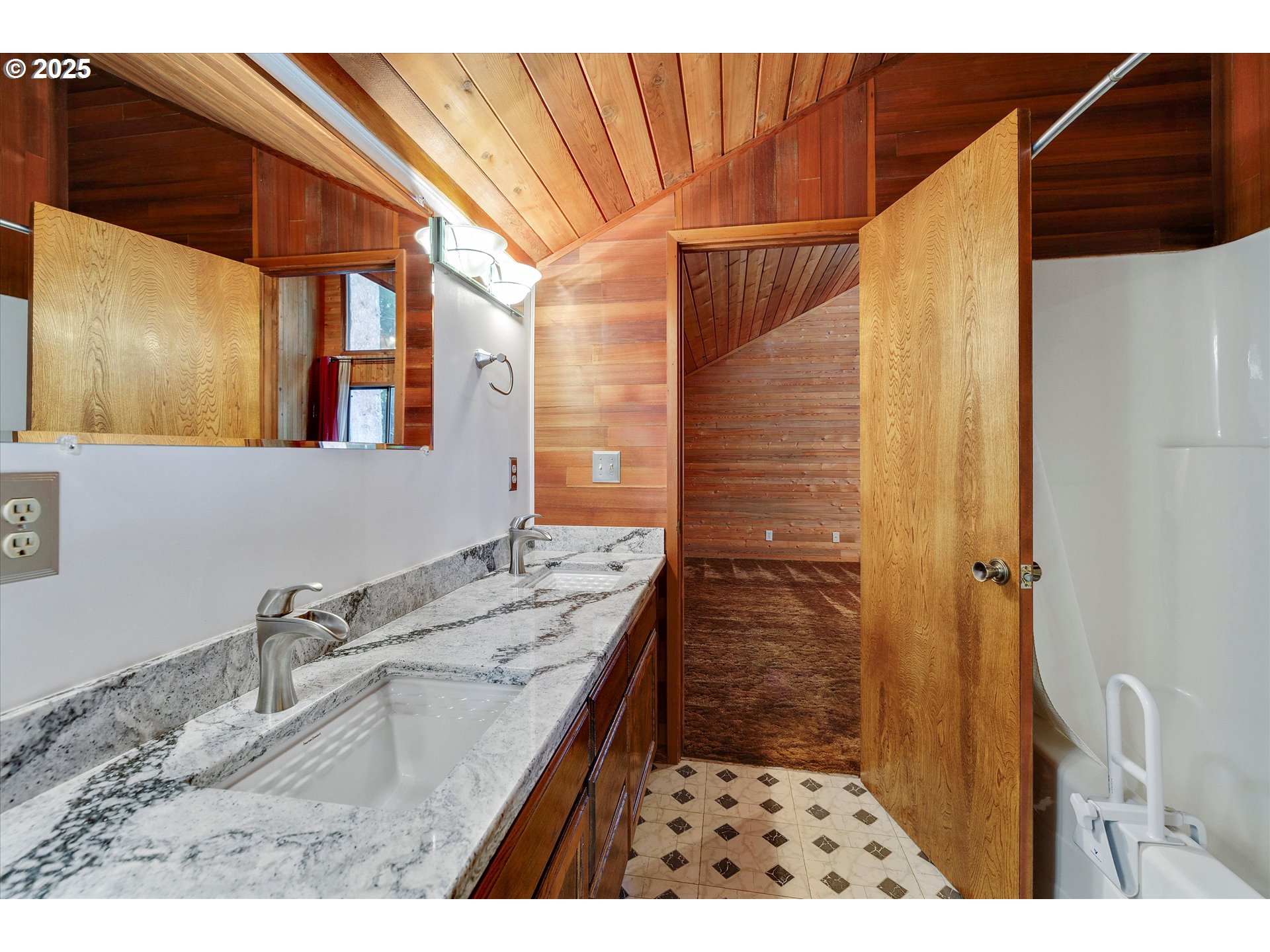 25164 South Springwater Road Estacada, OR 97023 - Photo 16 of 43 a bathroom with a sink and a mirror