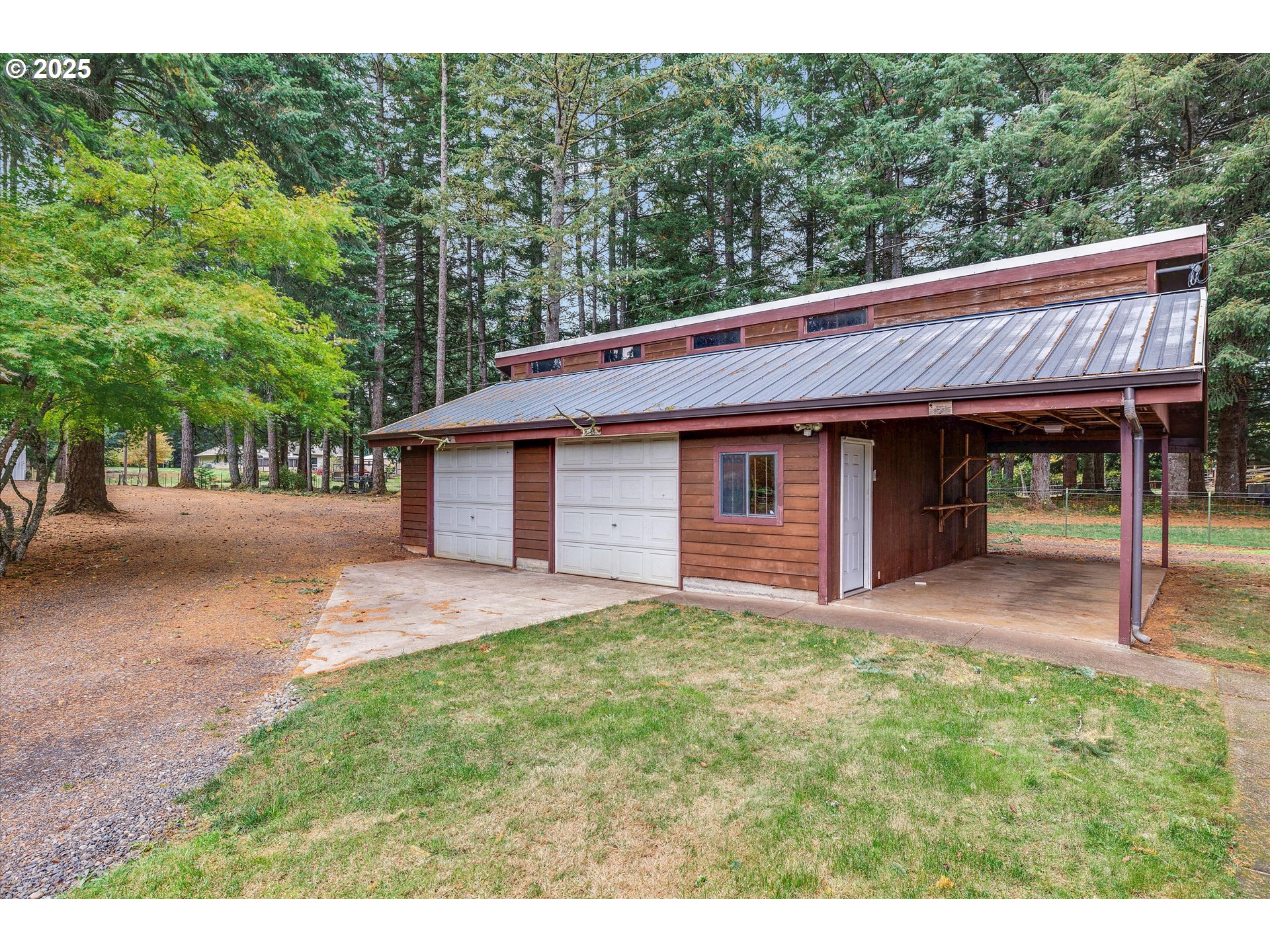 25164 South Springwater Road Estacada, OR 97023 - Photo 20 of 43 a view of a house with a backyard