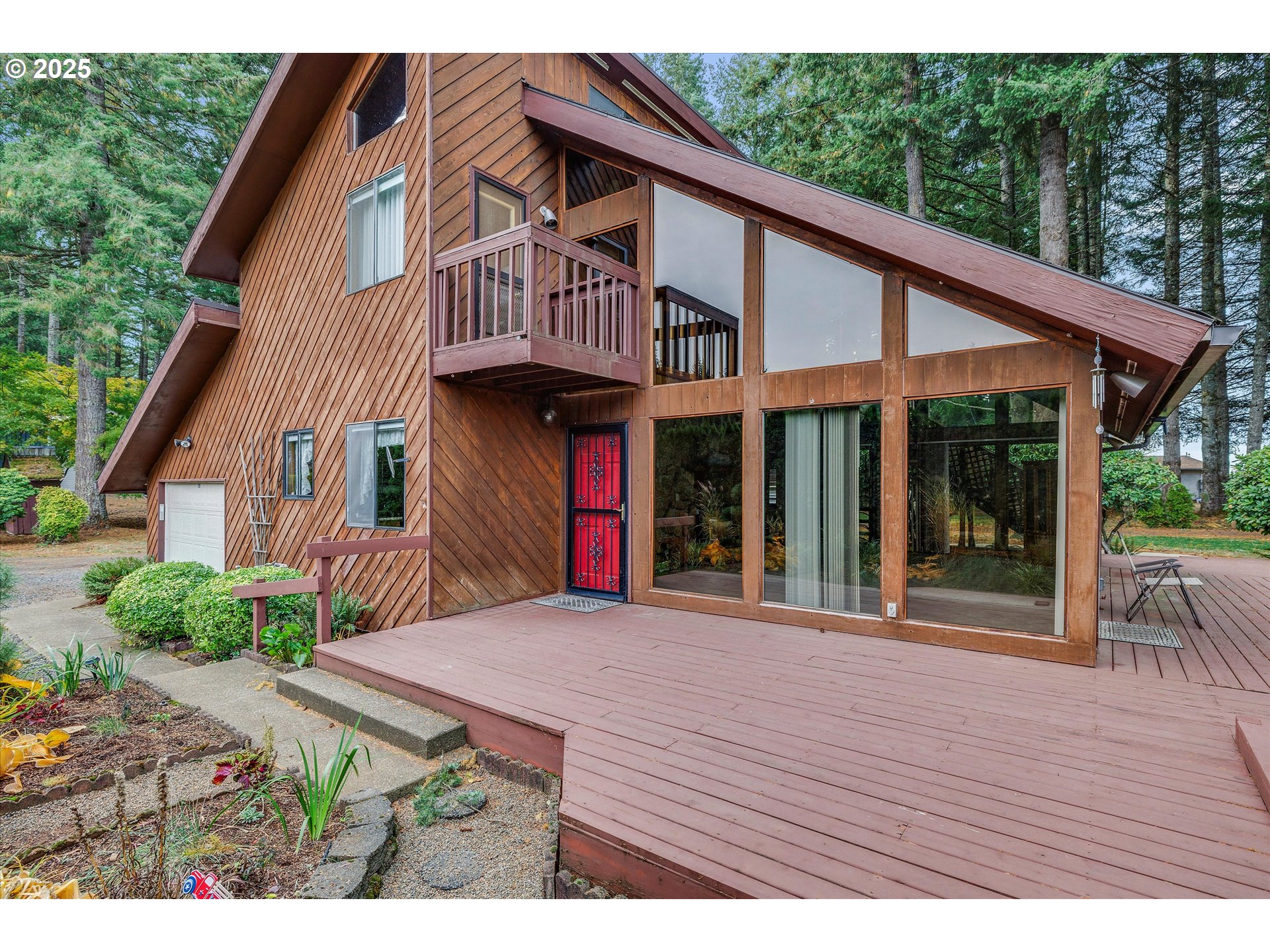 25164 South Springwater Road Estacada, OR 97023 - Photo 31 of 43 a view of a house with roof deck and furniture