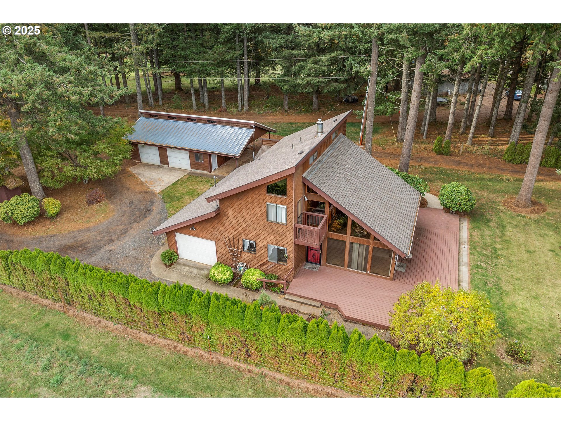 25164 South Springwater Road Estacada, OR 97023 - Photo 35 of 43 a aerial view of a house with swimming pool next to a big yard