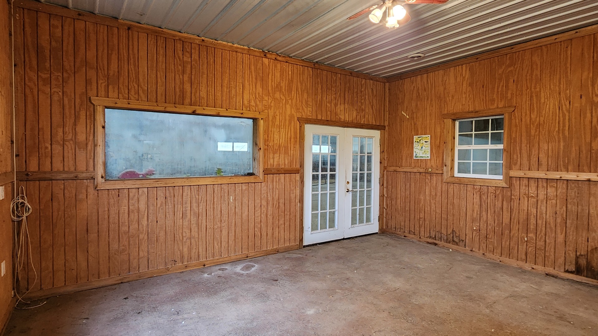 6079 Manchester Road Poplar Grove, IL 61065 - Photo 26 of 69 a view of an empty room with wooden walls