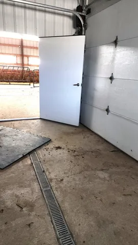 a view of storage and utility room with washer and dryer