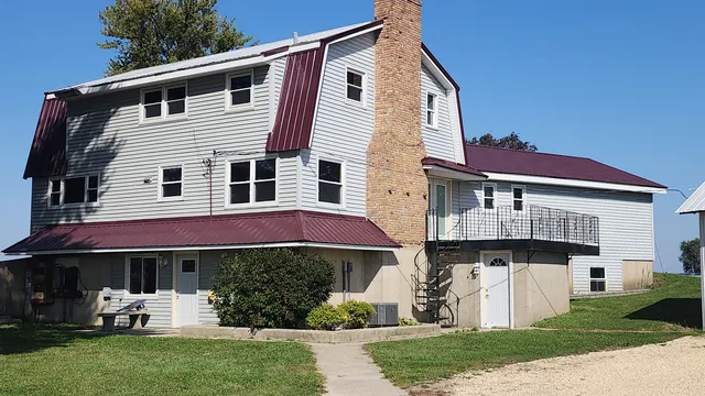 a front view of a house with a porch