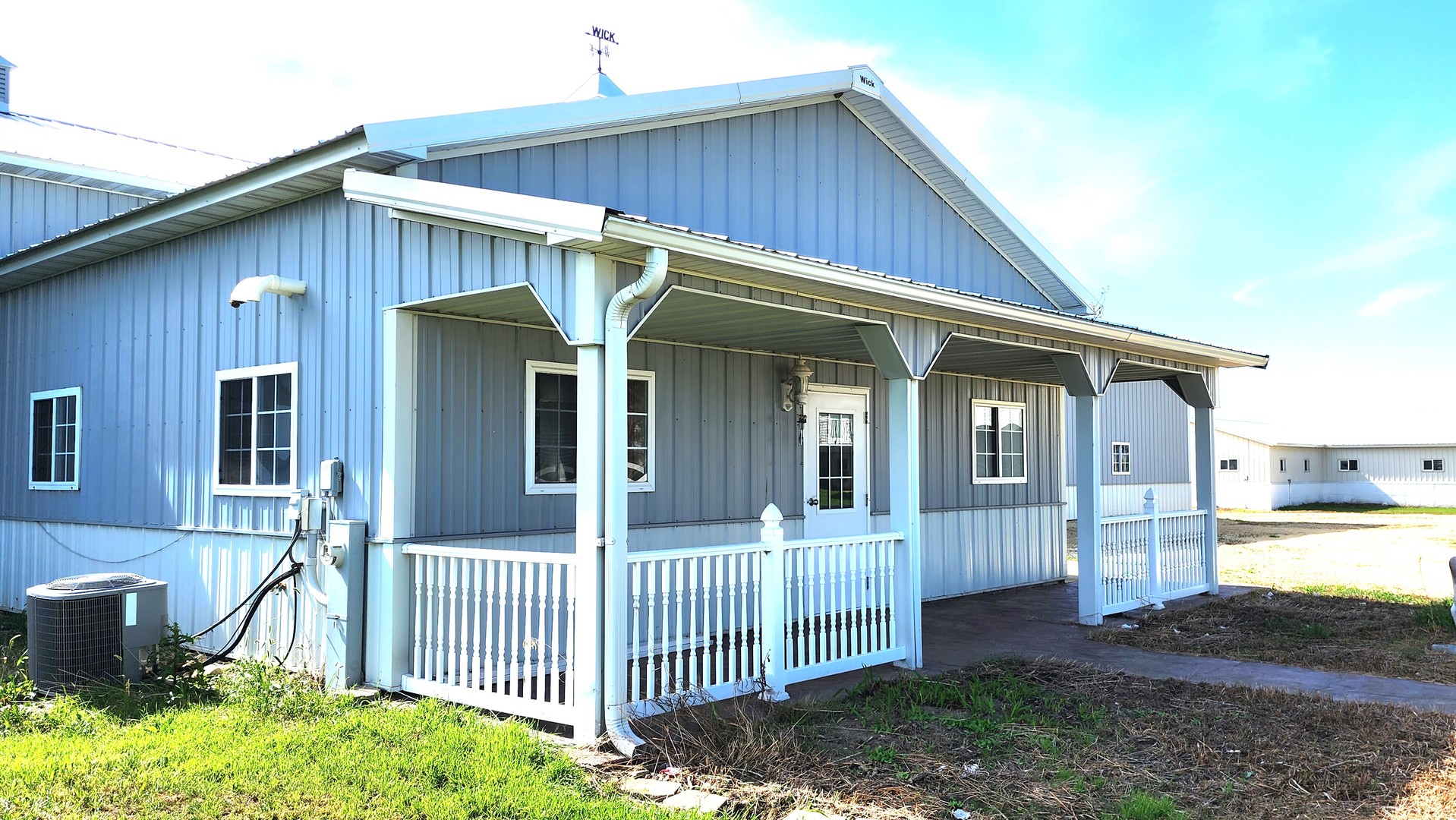 6079 Manchester Road Poplar Grove, IL 61065 - Photo 5 of 69 a front view of a house with a porch