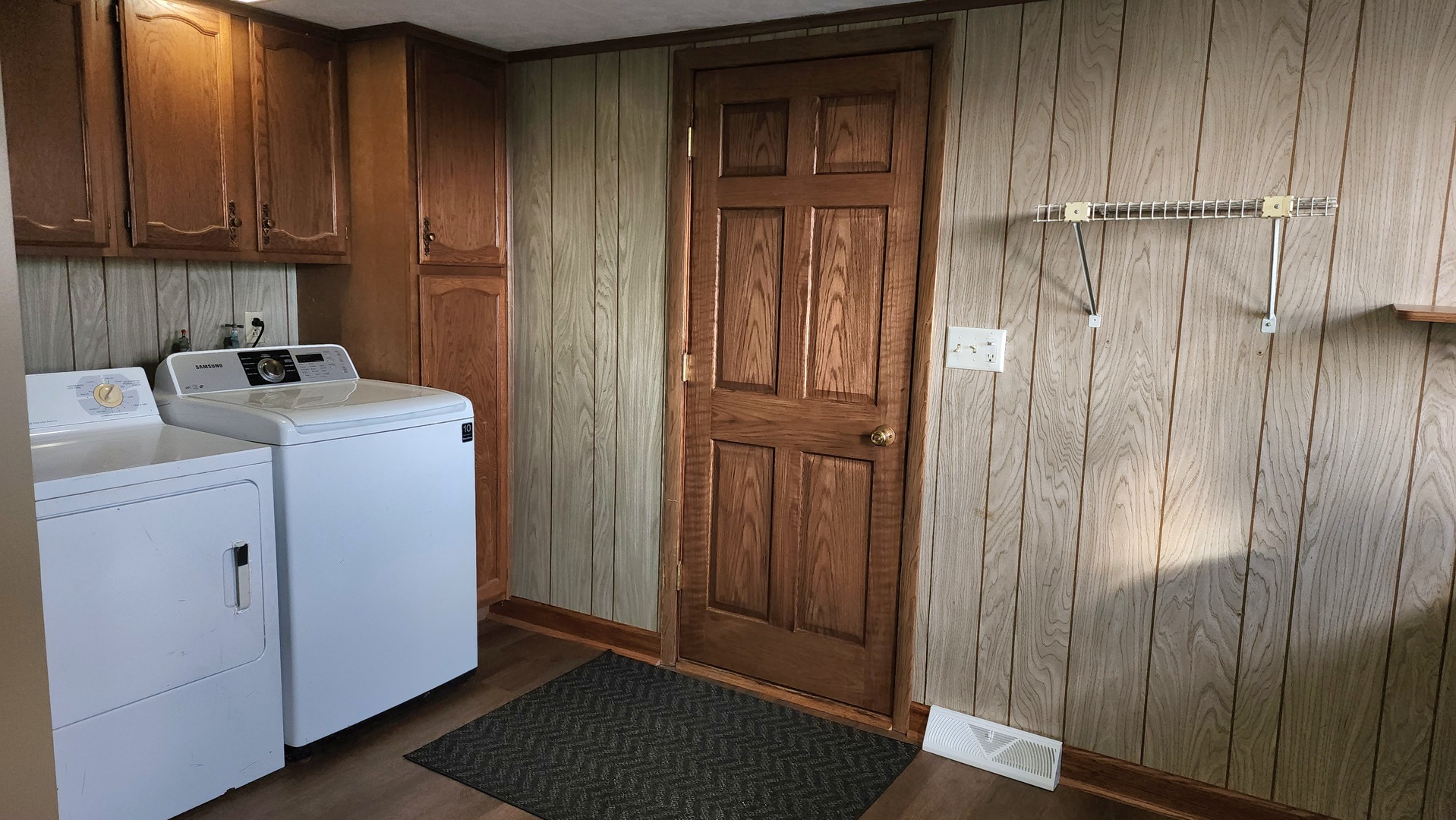 6079 Manchester Road Poplar Grove, IL 61065 - Photo 57 of 69 a view of storage and utility room with washer and dryer