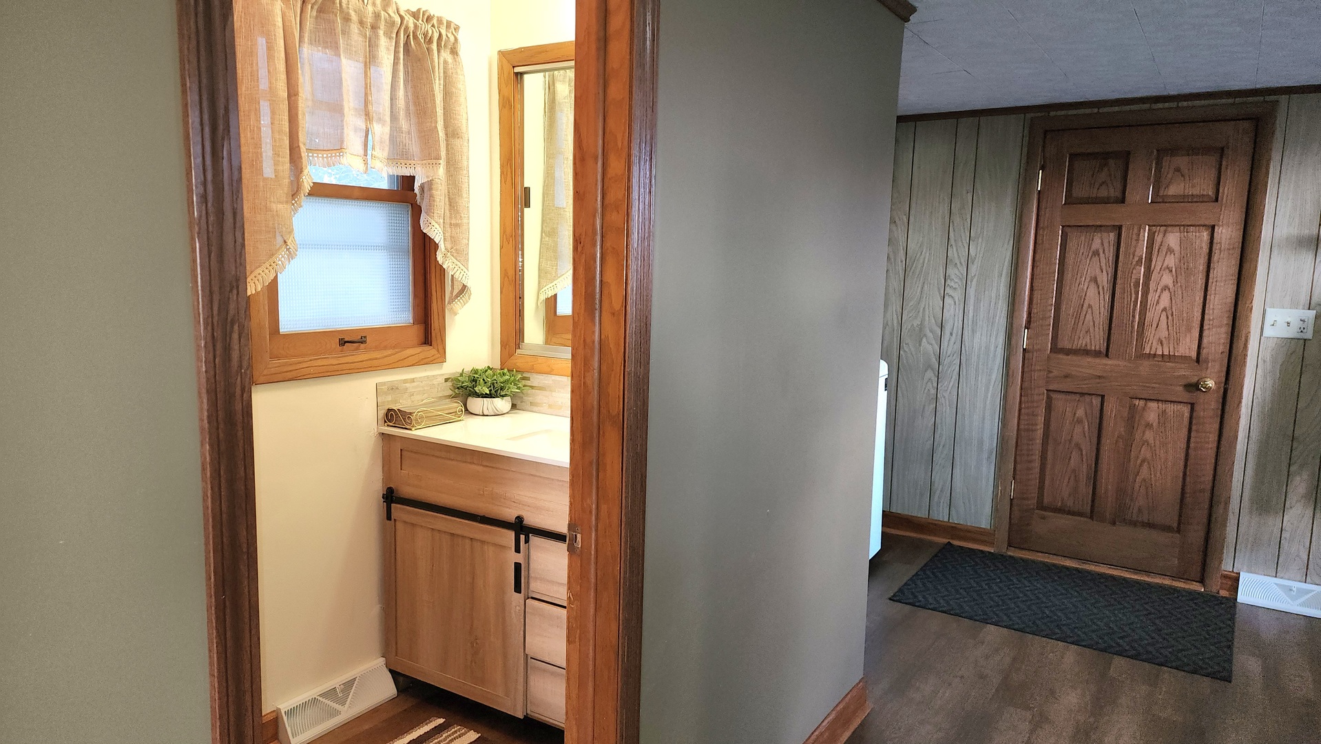 6079 Manchester Road Poplar Grove, IL 61065 - Photo 58 of 69 a bathroom with a granite countertop sink and a mirror