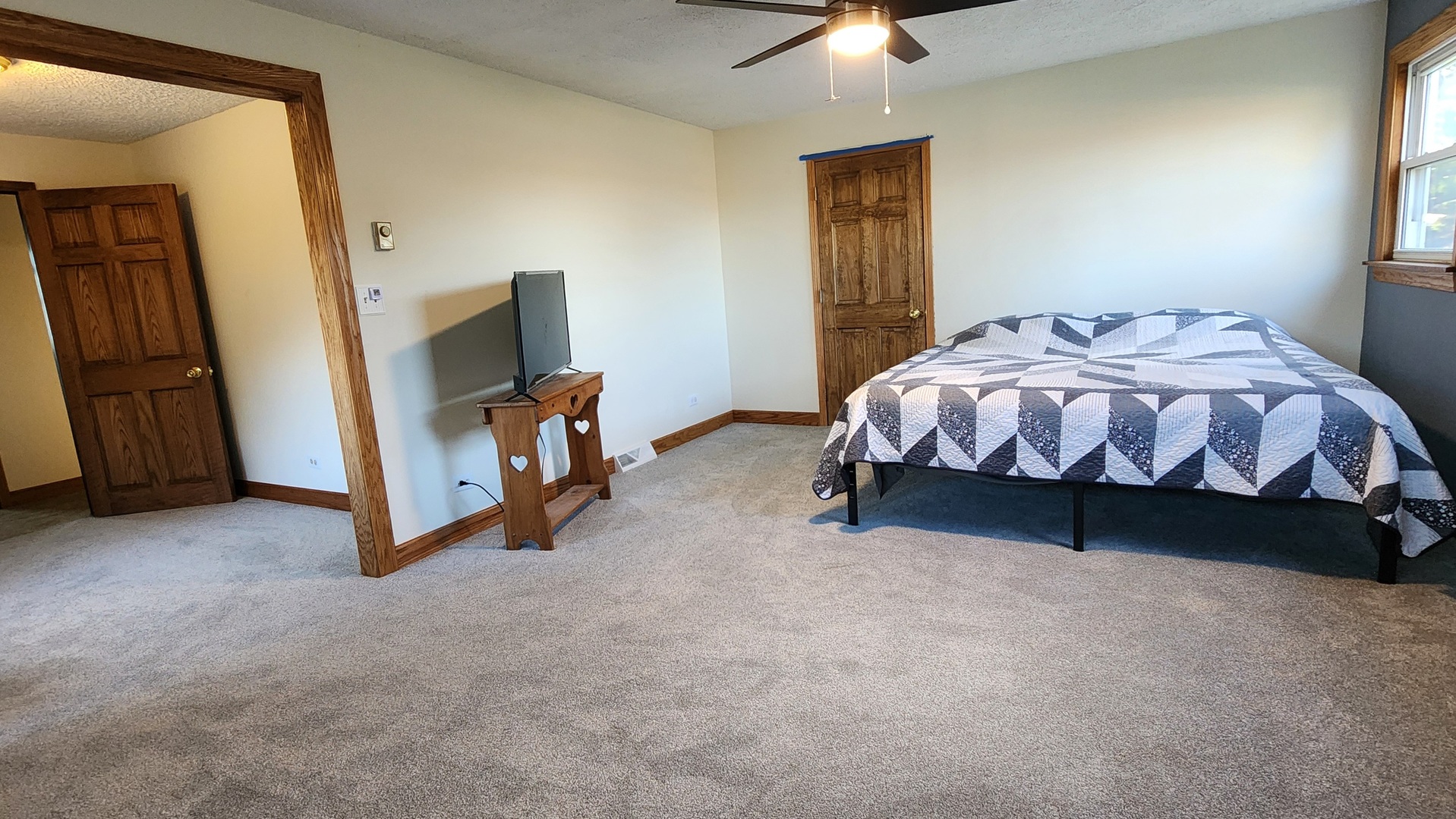 6079 Manchester Road Poplar Grove, IL 61065 - Photo 60 of 69 a bed sitting in a room next to a window