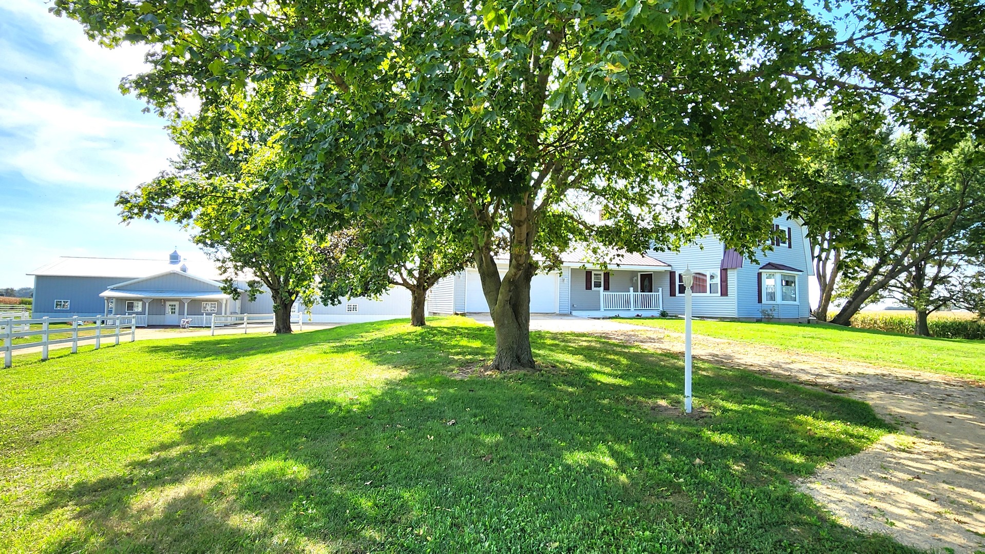 6079 Manchester Road Poplar Grove, IL 61065 - Photo 7 of 69 a view of a house with a big yard