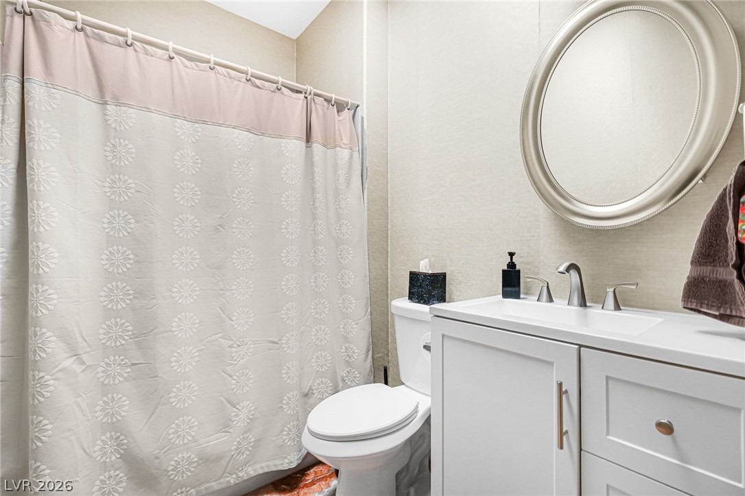 2738 Grand Forks Road Henderson, NV 89052 - Photo 29 of 52 Clean lines and a modern vanity define this updated full bathroom.