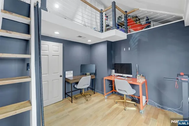 a workspace with furniture and a window