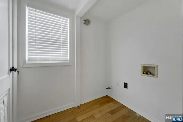 a view of a room that has a window in it