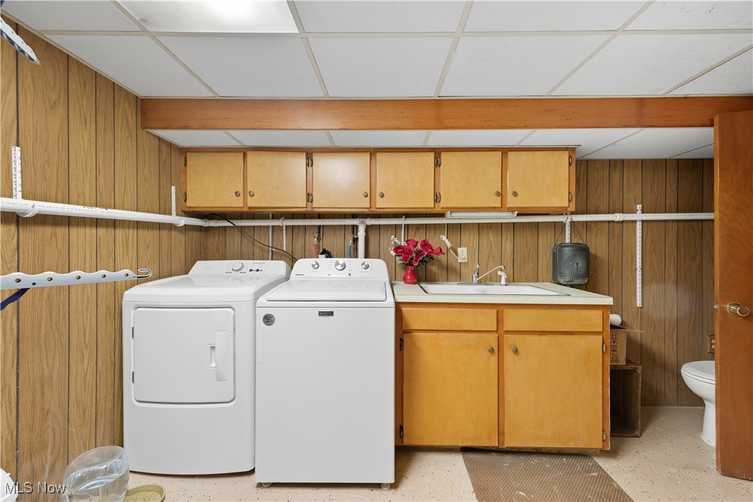 31085 Georgetown Road Salem, OH 44460 - Photo 25 of 50 Washroom with wooden walls and separate washer and dryer