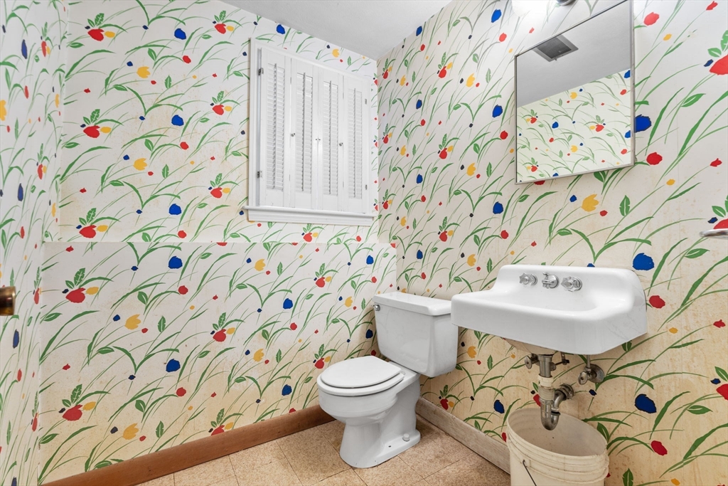 348 Belknap Road Framingham, MA 01701 - Photo 26 of 35 a bathroom with a sink and a toilet