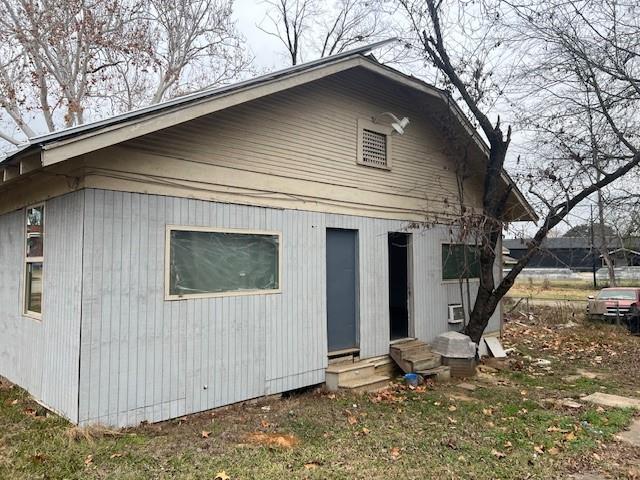 400 East Cotton Street Longview, TX 75601 - Photo 2 of 10 a view of a house with a yard