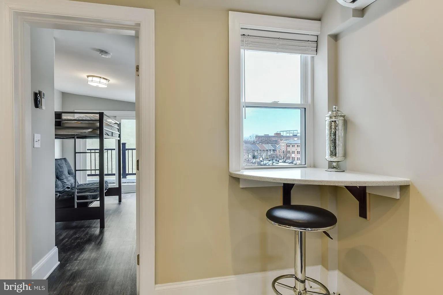 734 Light Street, Unit 2 Baltimore, MD 21230 - Photo 14 of 17 a room with a table and chairs