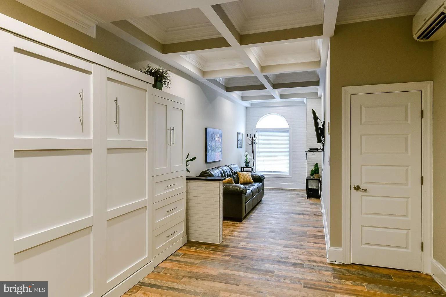 734 Light Street, Unit 2 Baltimore, MD 21230 - Photo 9 of 17 a view of a living room with a wooden floor