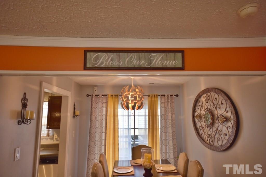 8301 Wynewood Court Raleigh, NC 27616 - Photo 12 of 22 a view of a hallway with entryway