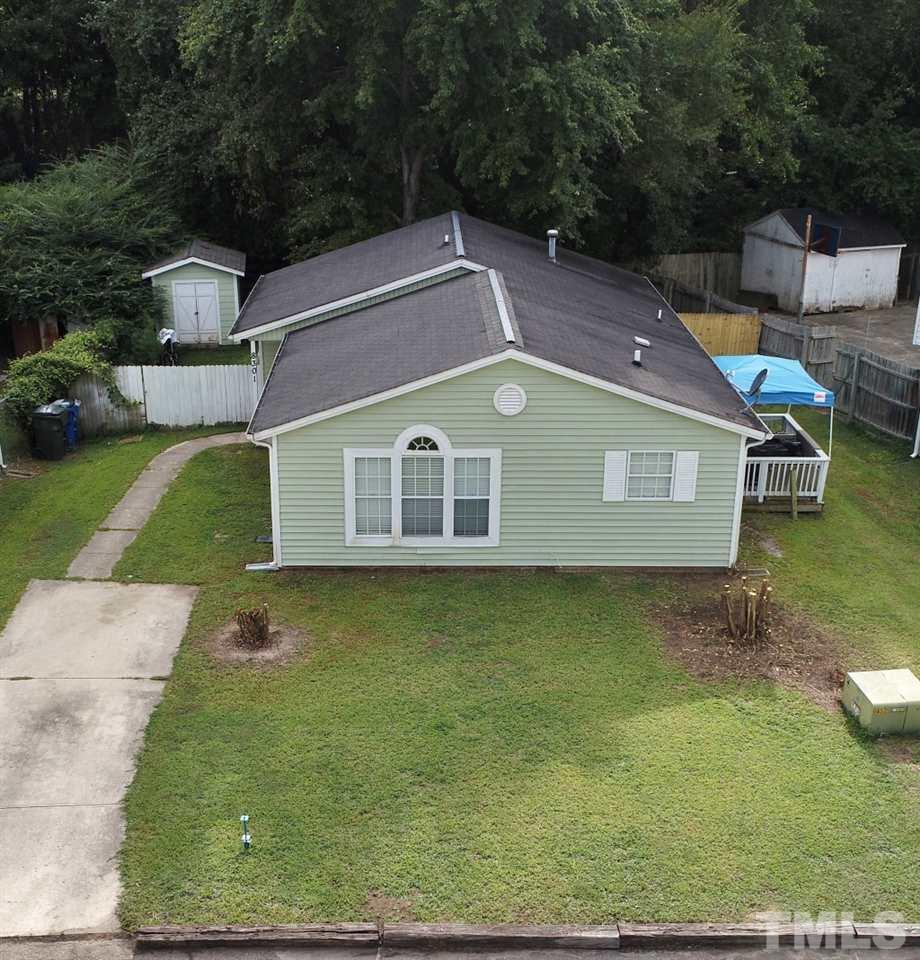 8301 Wynewood Court Raleigh, NC 27616 - Photo 4 of 22 a aerial view of a house with a yard