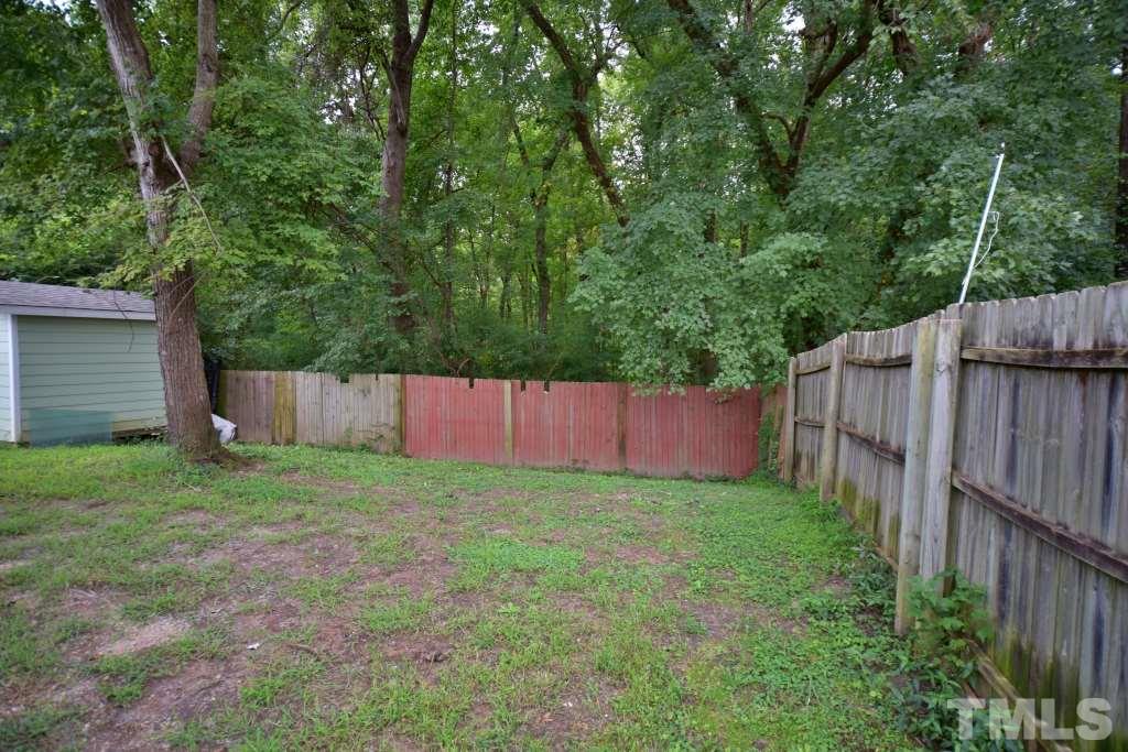 8301 Wynewood Court Raleigh, NC 27616 - Photo 7 of 22 a view of a backyard