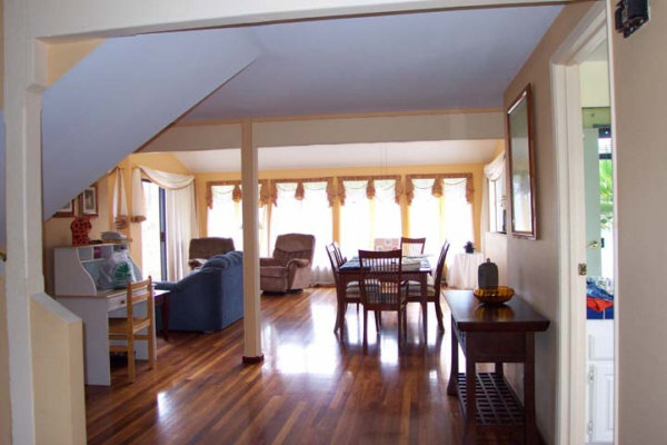 8582 Elepaio Road Kekaha, HI 96752 - Photo 6 of 6 a view of a dining room with furniture window and wooden floor