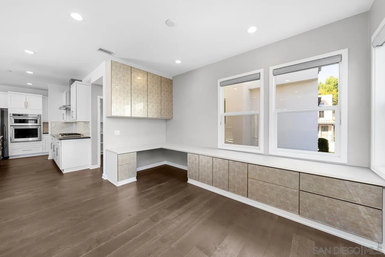8352 Ridge Court San Diego, CA 92108 - Photo 19 of 68 a view of kitchen with wooden floor and electronic appliances