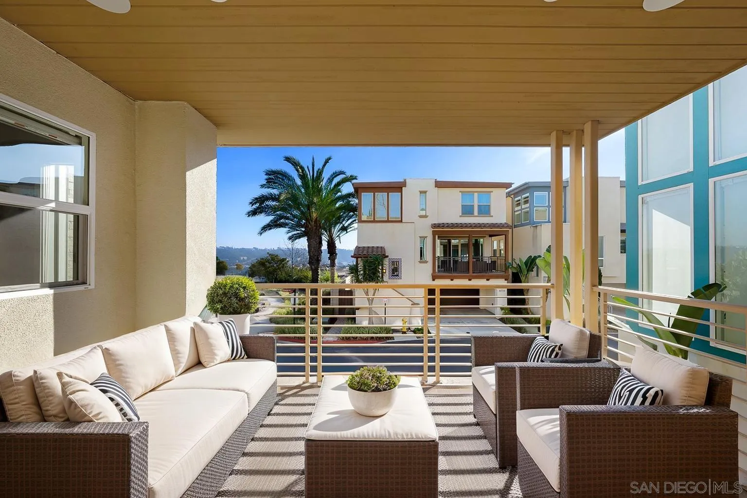 8352 Ridge Court San Diego, CA 92108 - Photo 2 of 68 a living room with furniture and a floor to ceiling window