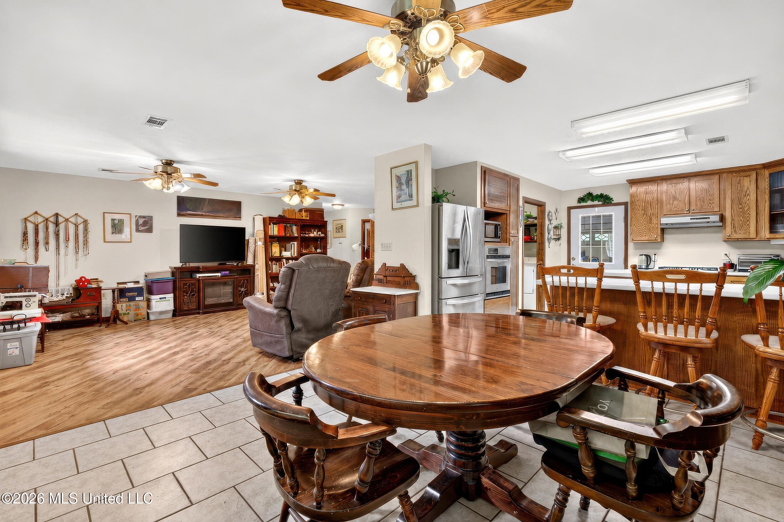 23 Hubert Spiers Road Carriere, MS 39426 - Photo 15 of 63 12_dining_livingroom_kitchen