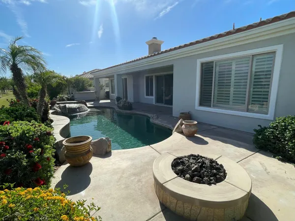 a house view with a garden space