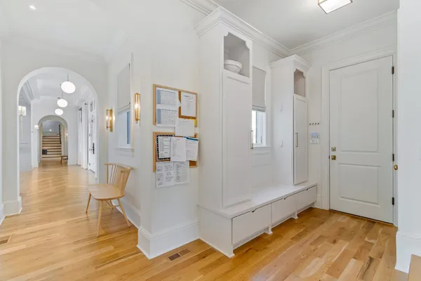 a bedroom with furniture and windows