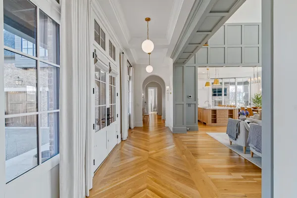 a large bathroom with a large tub and sink
