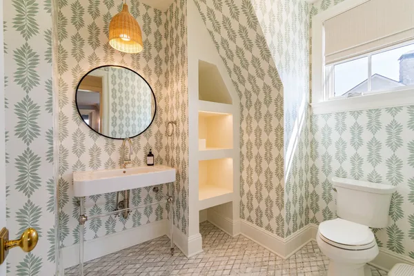 a utility room with sink dryer and washer