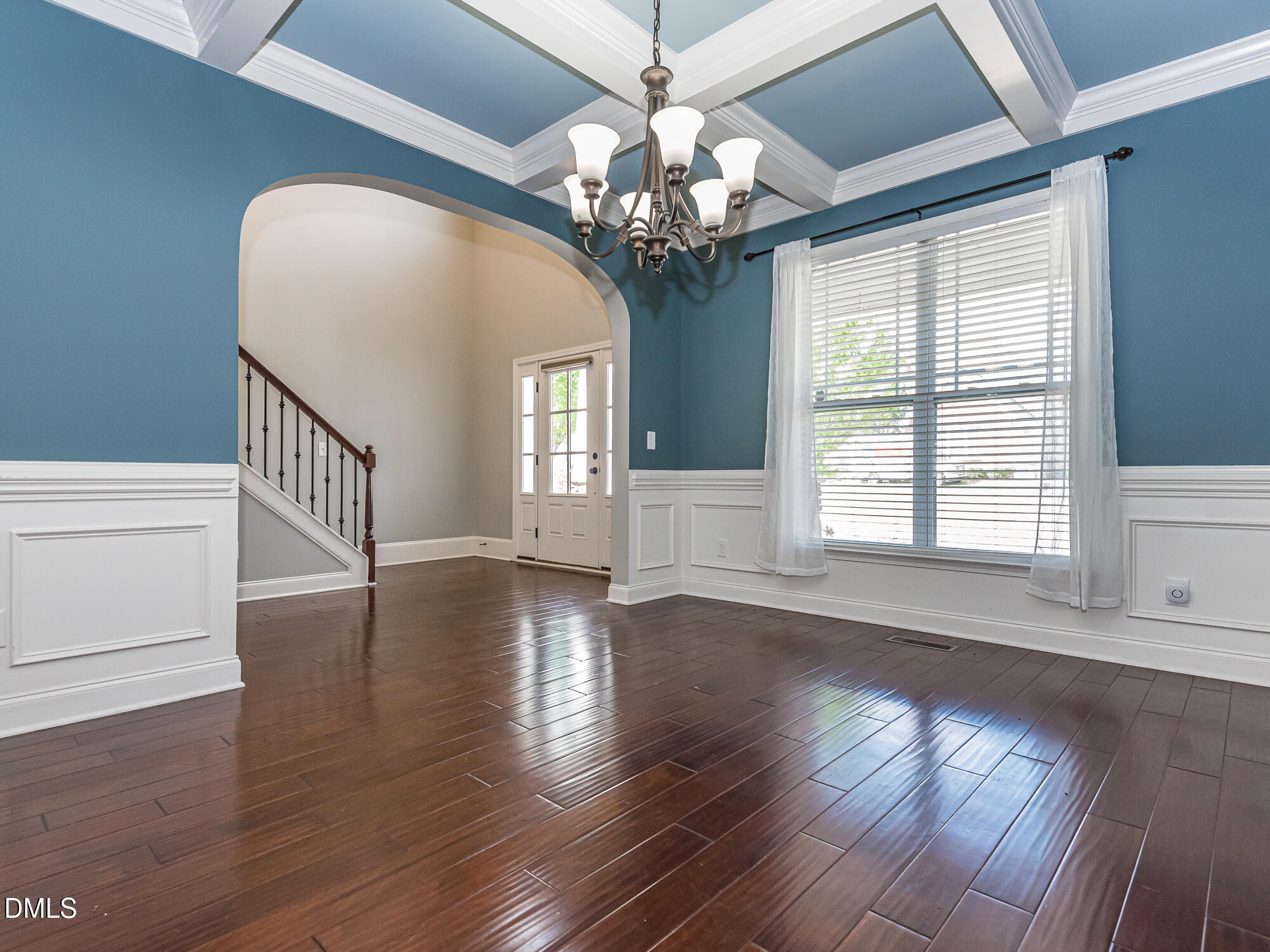 337 Shadowdale Lane Rolesville, NC 27571 - Photo 11 of 42 a view of a livingroom with wooden floor and a large window