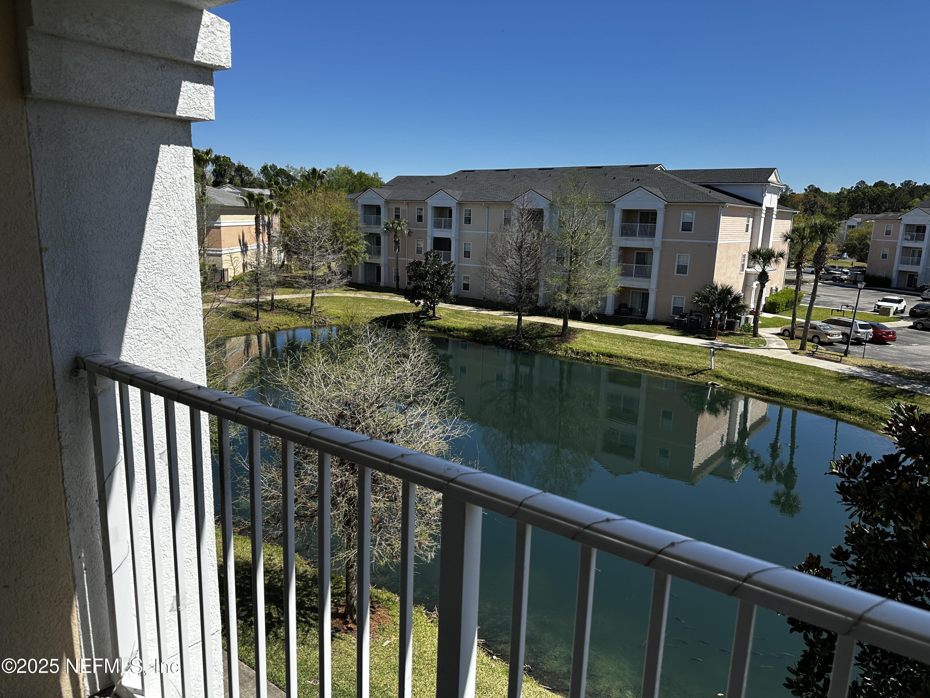 4917 Key Lime Drive, Unit 306 Jacksonville, FL 32256 - Photo 28 of 51 a view of swimming pool from a balcony