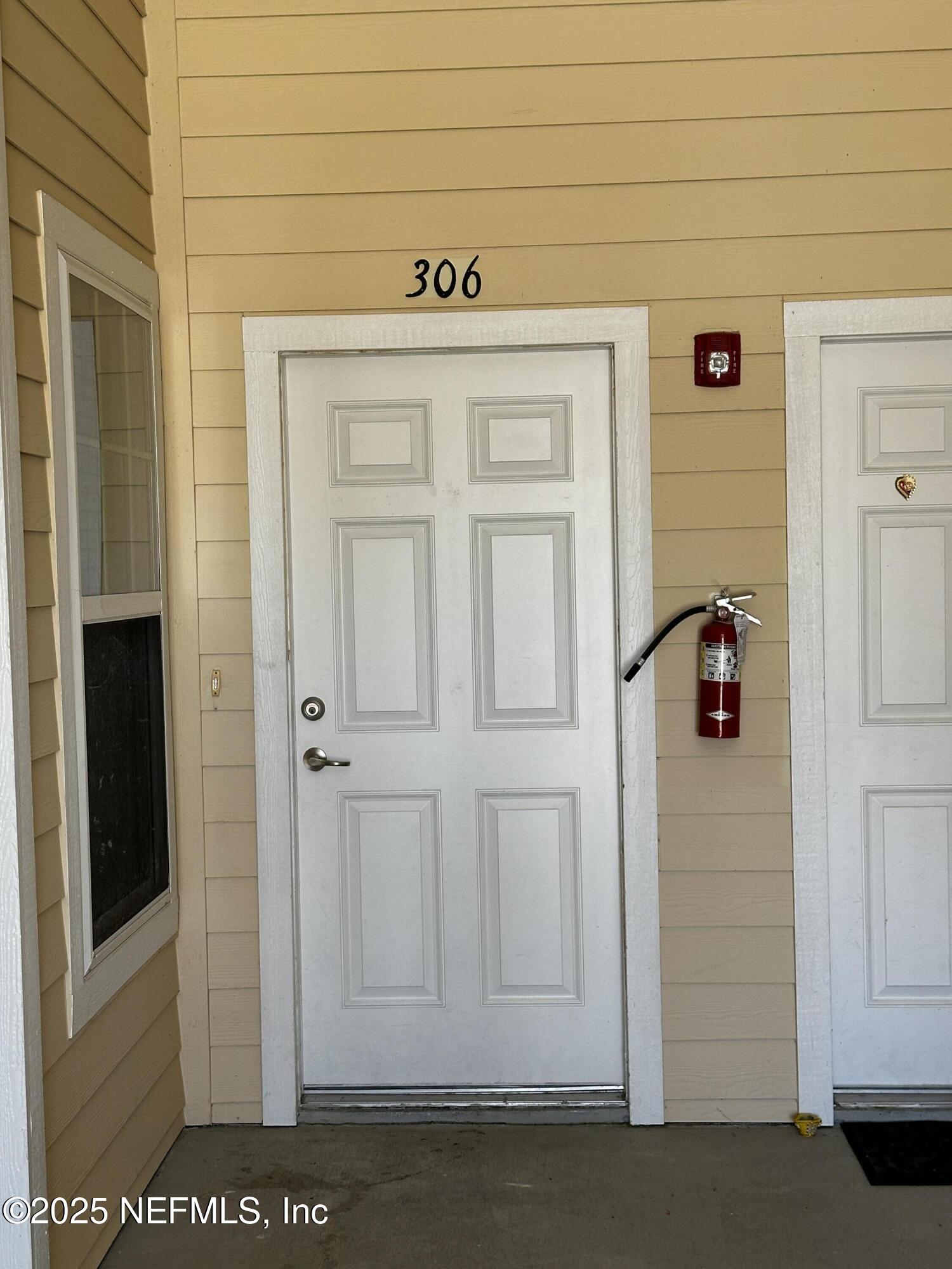 4917 Key Lime Drive, Unit 306 Jacksonville, FL 32256 - Photo 3 of 51 a view of front door