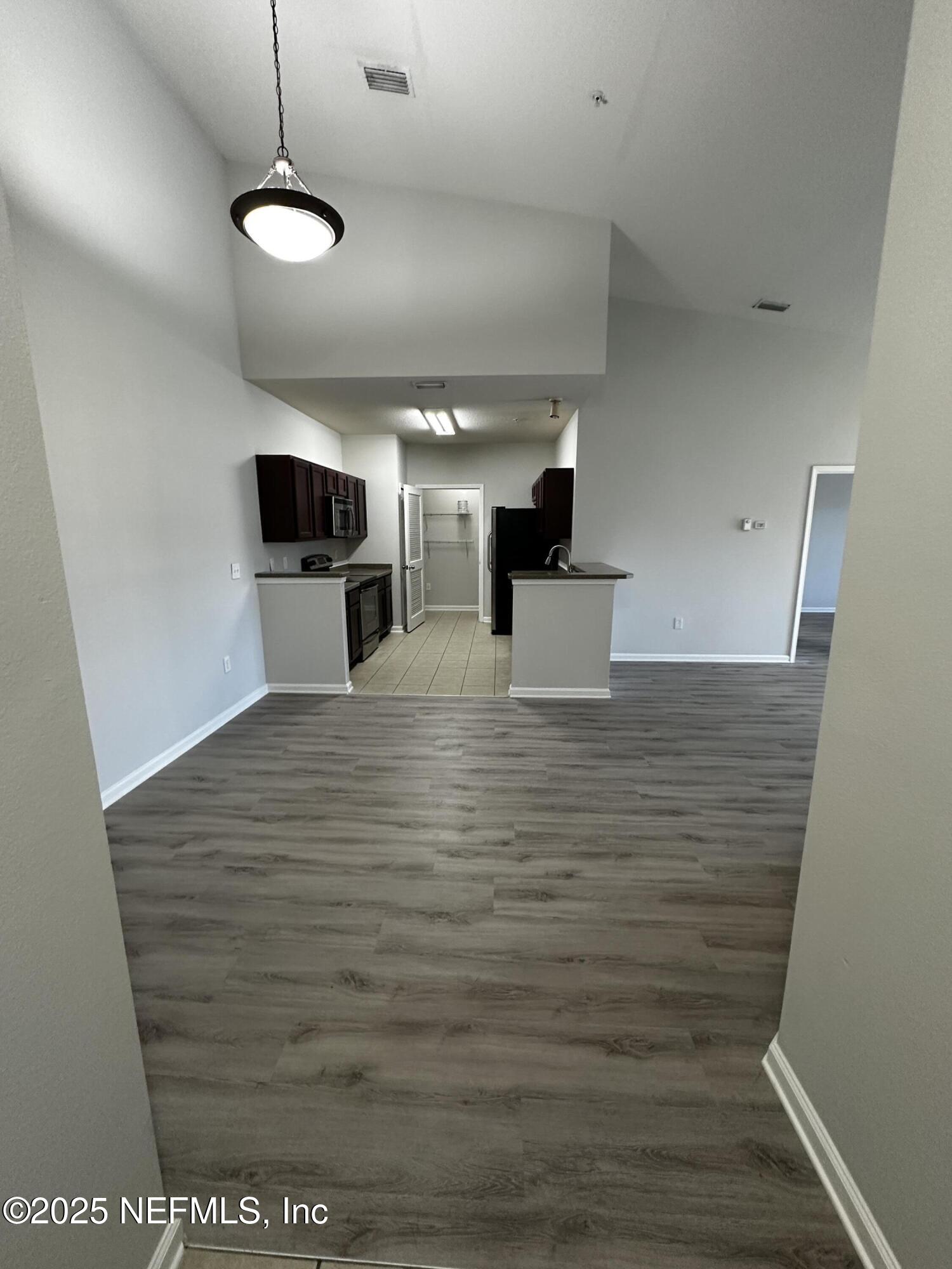 4917 Key Lime Drive, Unit 306 Jacksonville, FL 32256 - Photo 4 of 51 a view of kitchen and microwave