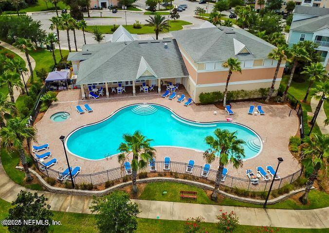 4917 Key Lime Drive, Unit 306 Jacksonville, FL 32256 - Photo 41 of 51 an aerial view of a house with swimming pool and large trees